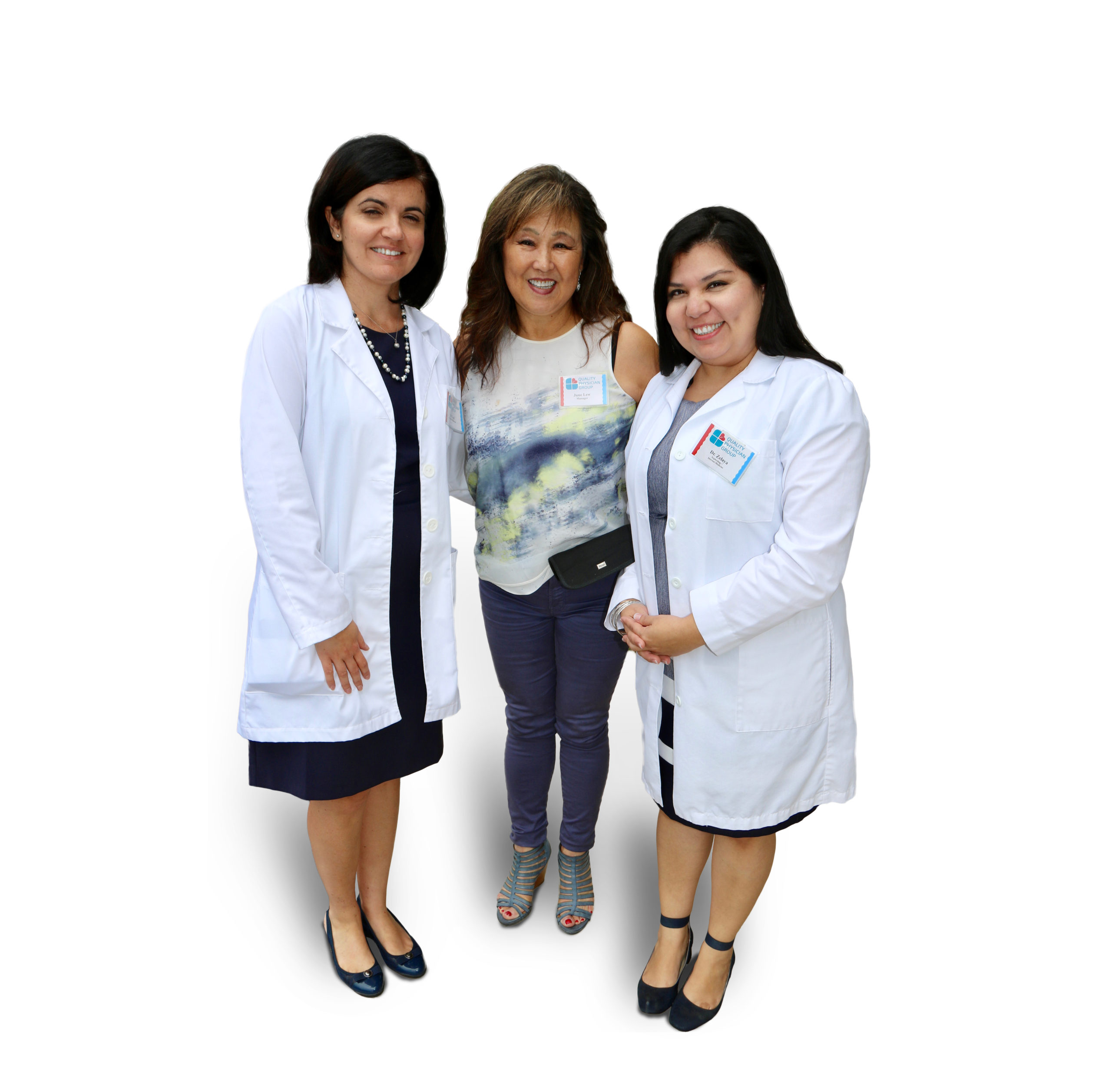 Three women in white lab coats standing next to each other.